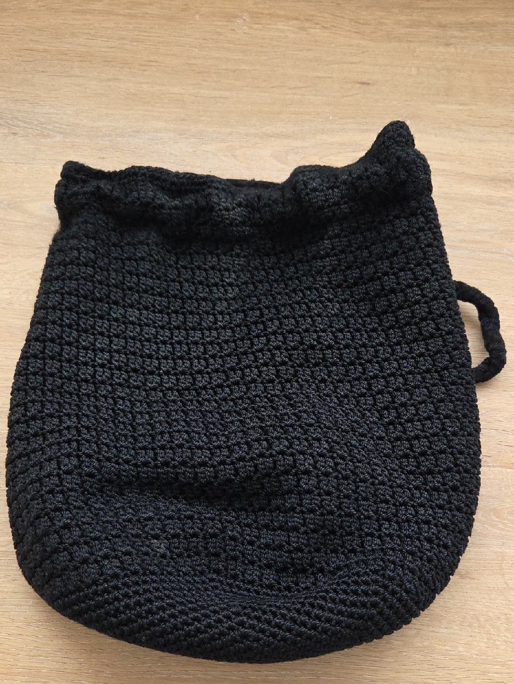 The Sak Black Crochet Drawstring Backpack